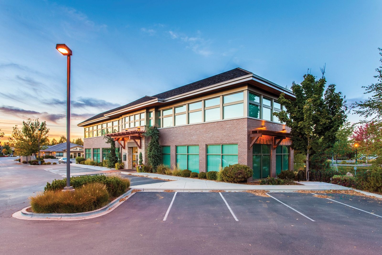 A modern medical office building with parking.